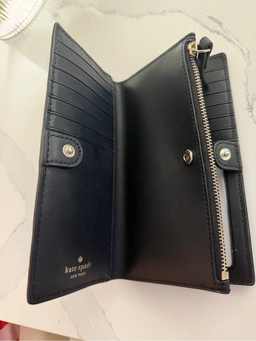kate spade Black Leather Zip-Around Wallet with Gold Logo